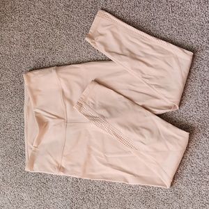 NWOT Light Pink leggings with cut out detail, medium